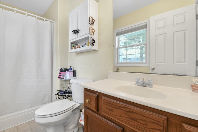 bathroom with vanity, curtained shower, and toilet