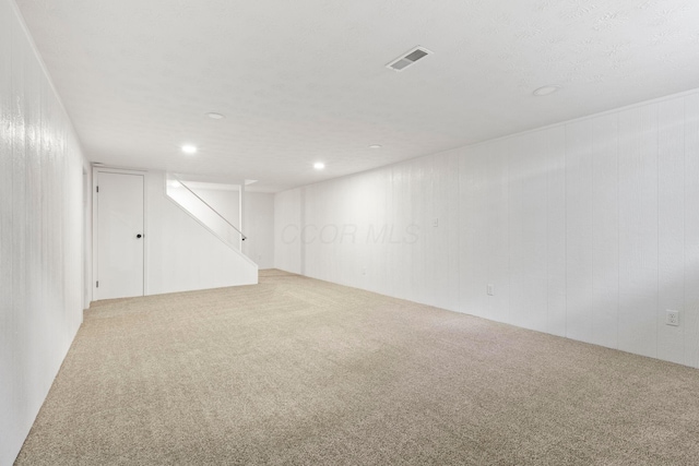 basement with carpet flooring