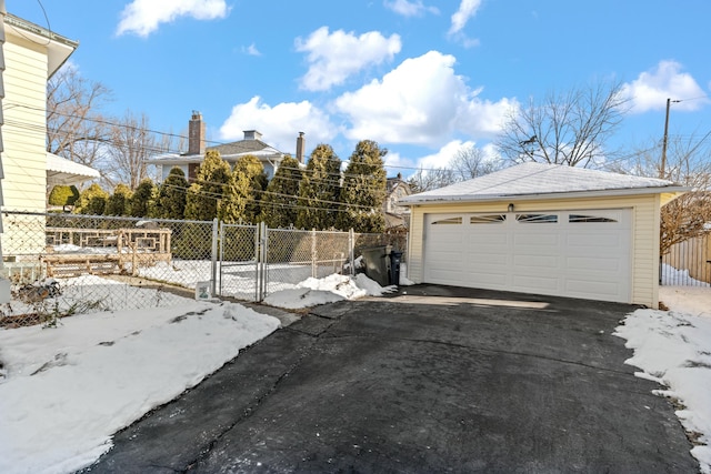 view of snow covered garage