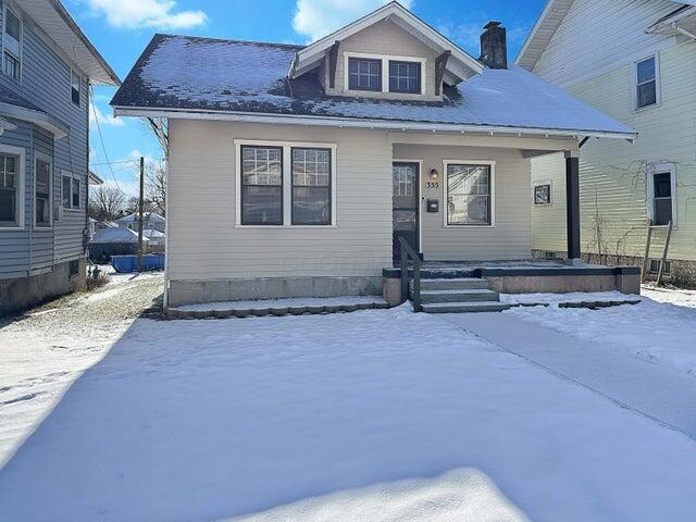 bungalow-style home with a porch