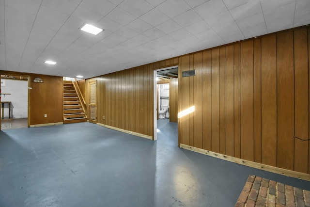 basement with wood walls