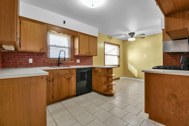 kitchen featuring ceiling fan, sink, backsplash, and black dishwasher