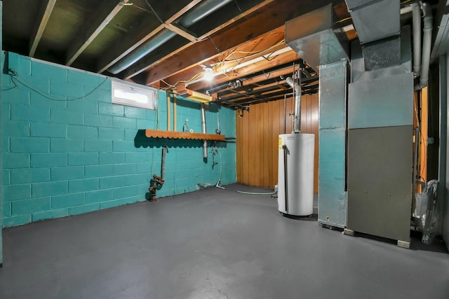 basement with gas water heater and heating unit