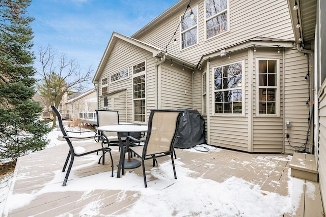 view of snow covered patio