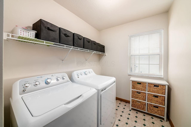 laundry area featuring separate washer and dryer