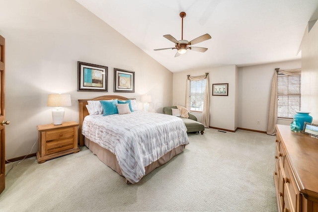 carpeted bedroom featuring lofted ceiling and ceiling fan