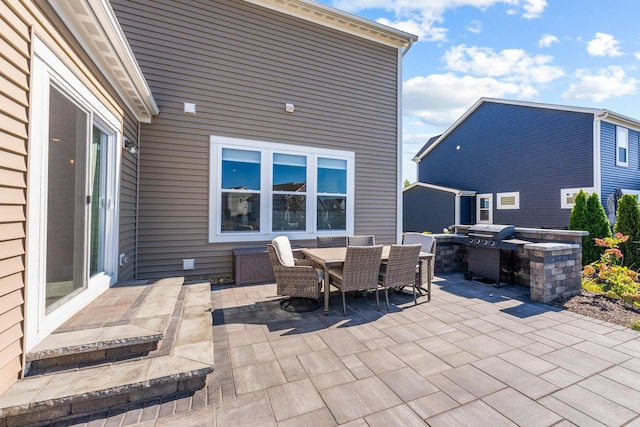 view of patio / terrace featuring exterior kitchen and area for grilling