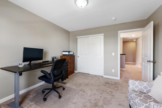 view of carpeted office space