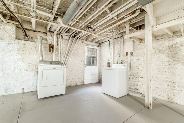 basement featuring separate washer and dryer