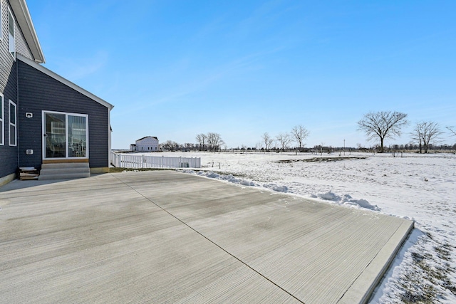 view of snow covered deck