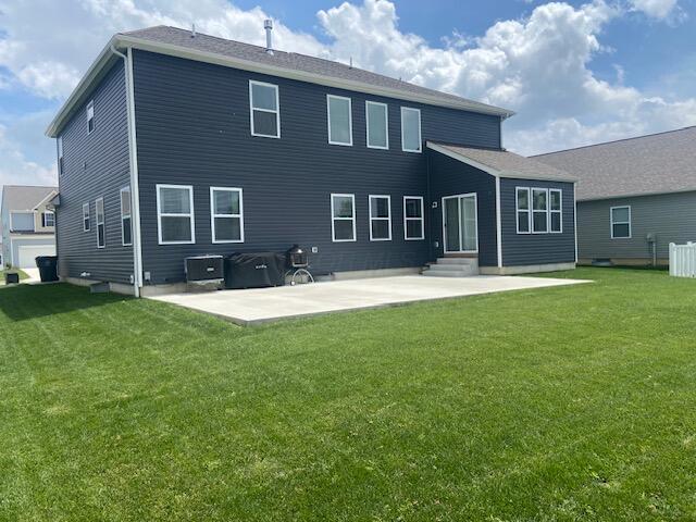 509 Walker Pointe Dr, Commercial Point, OH 43116 - back of house with a patio area, a lawn, cooling unit, and entry steps
