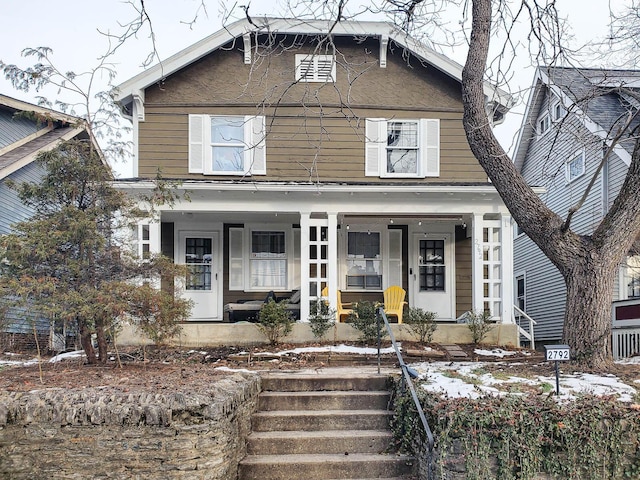 view of front of property featuring covered porch