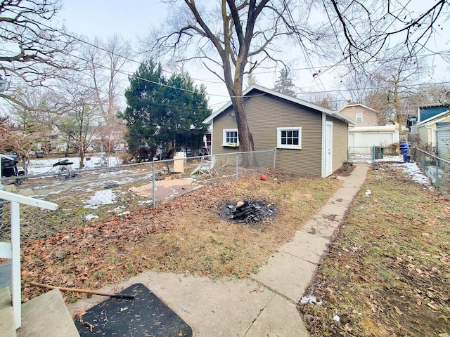 view of side of property featuring an outbuilding