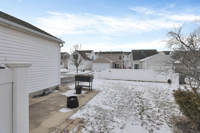 view of yard covered in snow