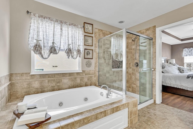 bathroom featuring ensuite bathroom, a stall shower, a whirlpool tub, and tile patterned flooring