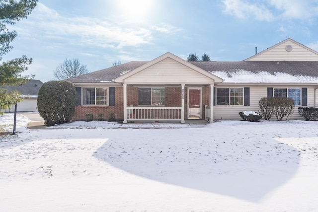 single story home featuring a porch