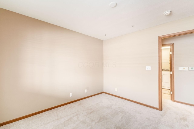 unfurnished room featuring carpet floors