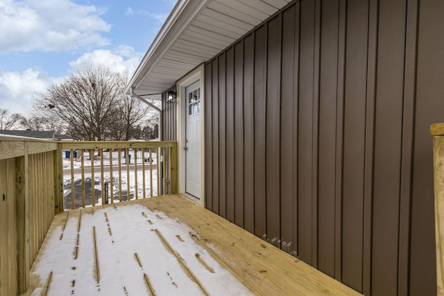 view of snow covered deck