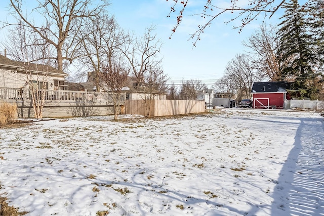 view of yard layered in snow