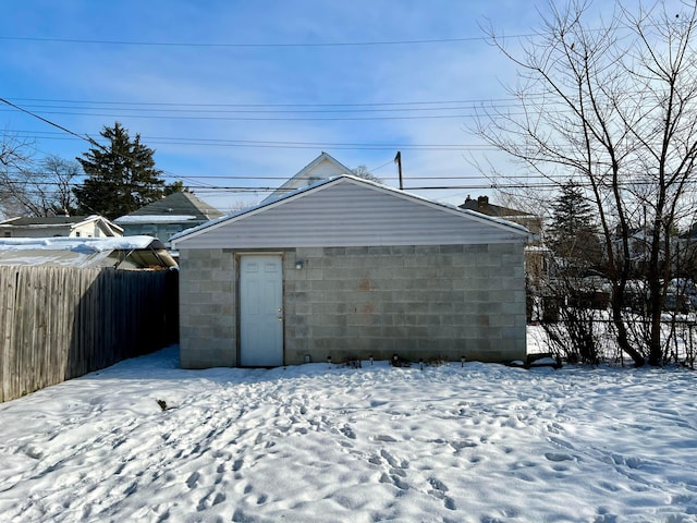 view of snow covered garage