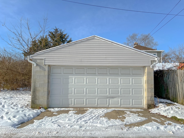 view of snow covered garage