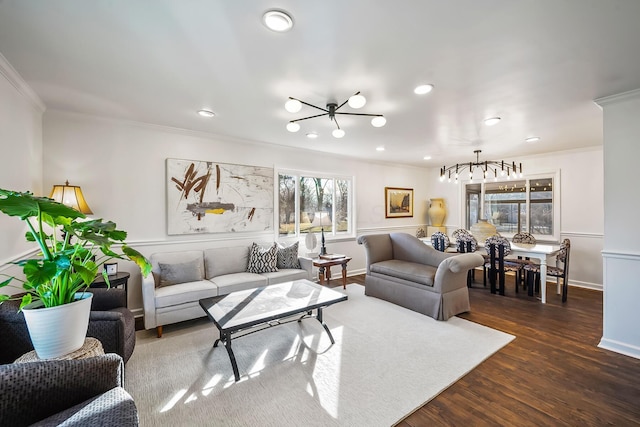 living room with ornamental molding and dark hardwood / wood-style flooring