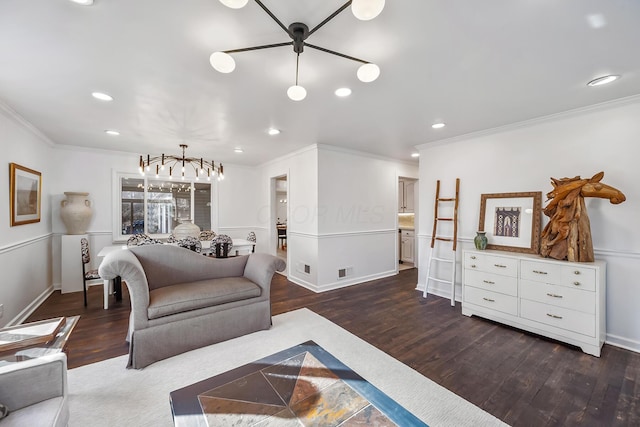 living room with ornamental molding and dark hardwood / wood-style flooring