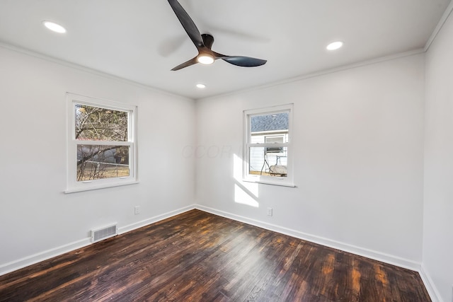 unfurnished room featuring crown molding, ceiling fan, and dark hardwood / wood-style floors