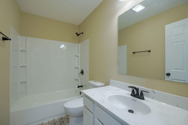 full bathroom featuring shower / bathing tub combination, toilet, and vanity