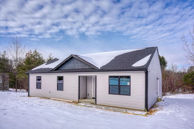 view of snow covered house