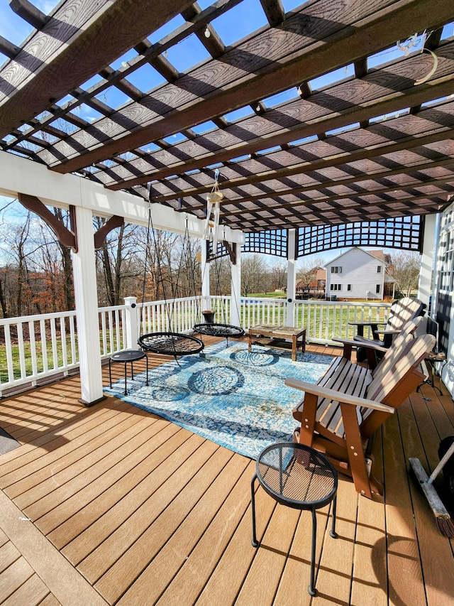 wooden terrace with a pergola