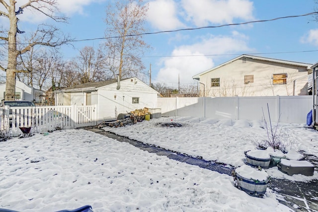 view of yard covered in snow