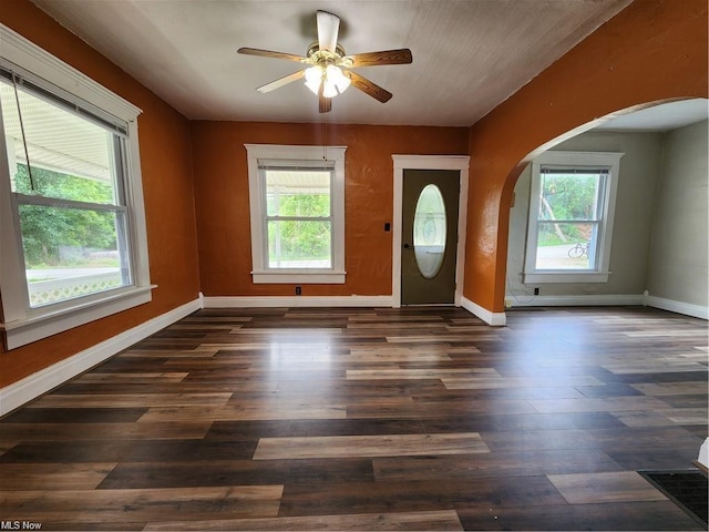 foyer entrance featuring ceiling fan and dark hardwood / wood-style floors