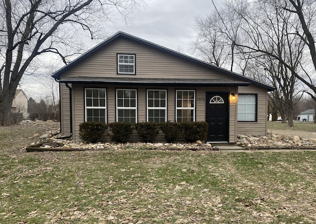 view of front of home with a front lawn