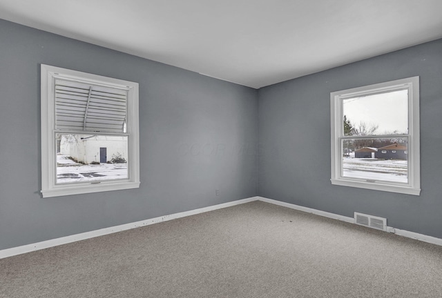 view of carpeted spare room