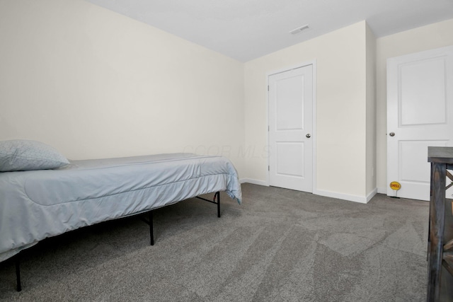 bedroom featuring carpet