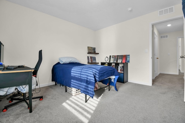 bedroom with light carpet