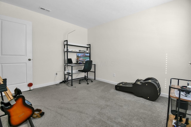 home office with carpet flooring