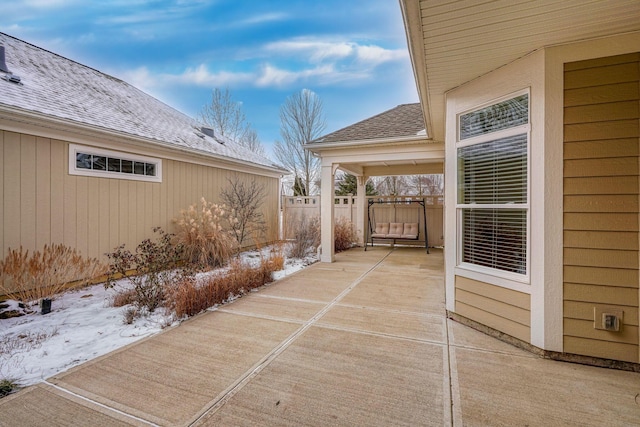 view of snow covered patio