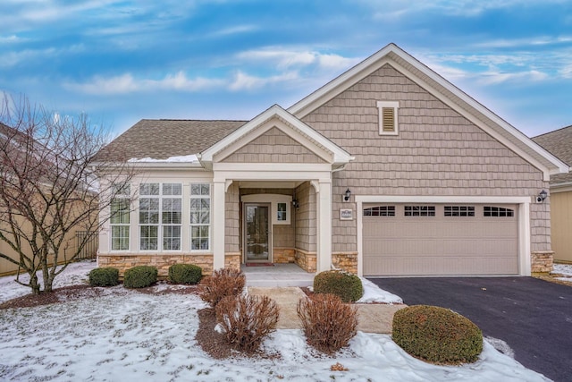 view of front of property featuring a garage