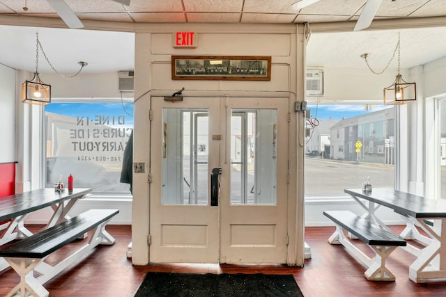 entryway featuring a drop ceiling and french doors