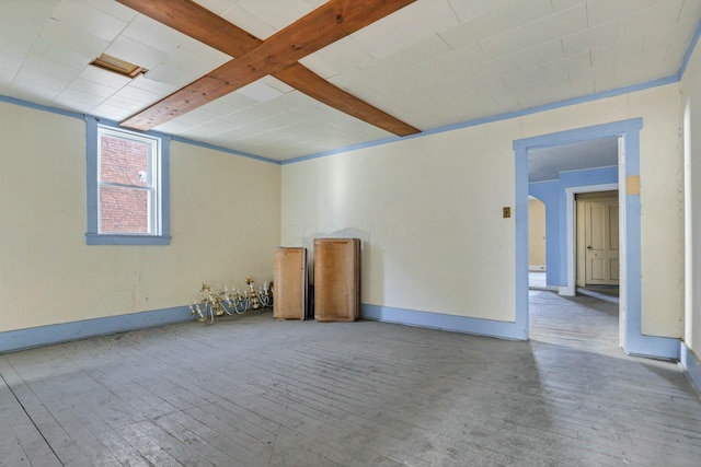 unfurnished room featuring hardwood / wood-style flooring