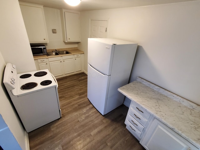 kitchen featuring dark hardwood / wood-style flooring, sink, white cabinets, light stone counters, and white appliances