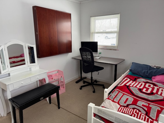 bedroom with light colored carpet