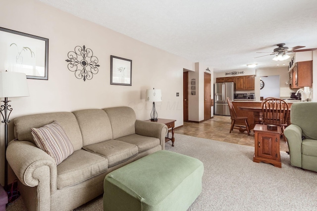 living room featuring ceiling fan