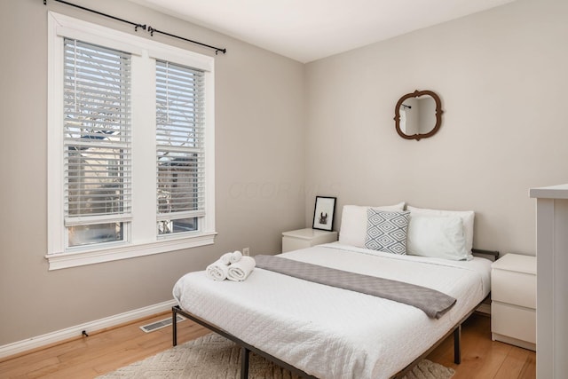 bedroom featuring light wood-type flooring