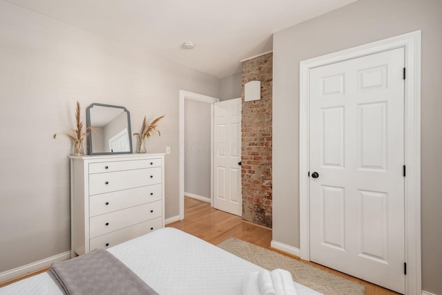 bedroom featuring light hardwood / wood-style flooring