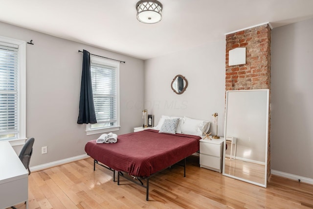 bedroom featuring light wood-type flooring