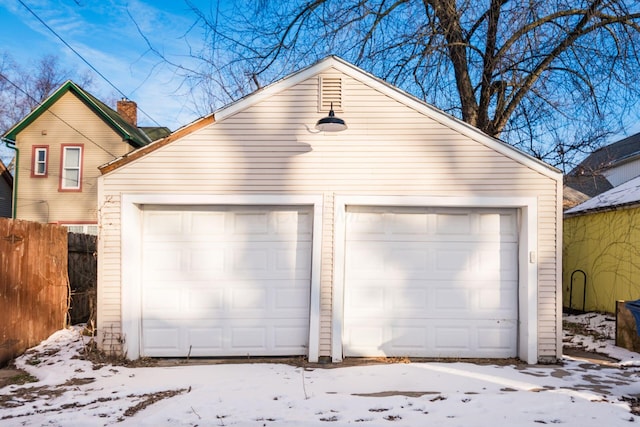 view of snow covered garage