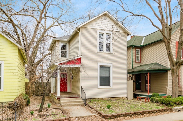 1017 Michigan Ave, Columbus, OH 43201 - view of front of house with a porch and fence